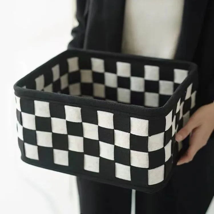 Checkerboard pattern folding felt storage basket measuring 37 by 29 by 19.5 centimetres