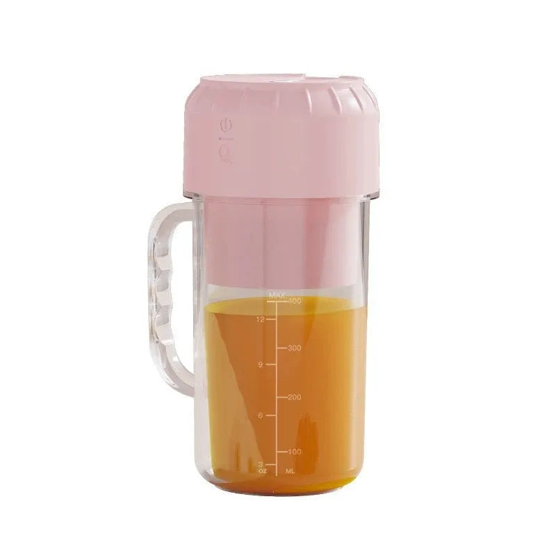 Portable USB juicer in cherry blossom pink or avocado green with multiple blade options