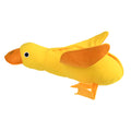 Yellow teddy dog training toy with integrated duck doll and food leak compartments