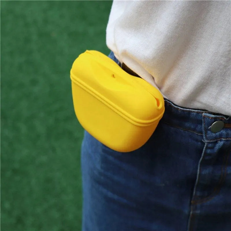 A silicone dog training treat bag with a belt clip, shown in one of six colour options.