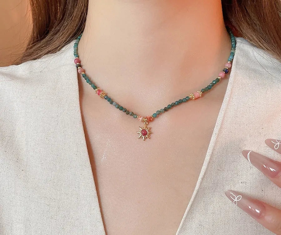Freshwater pearl necklace with stone pendant and sun charm in geometric French royal court style