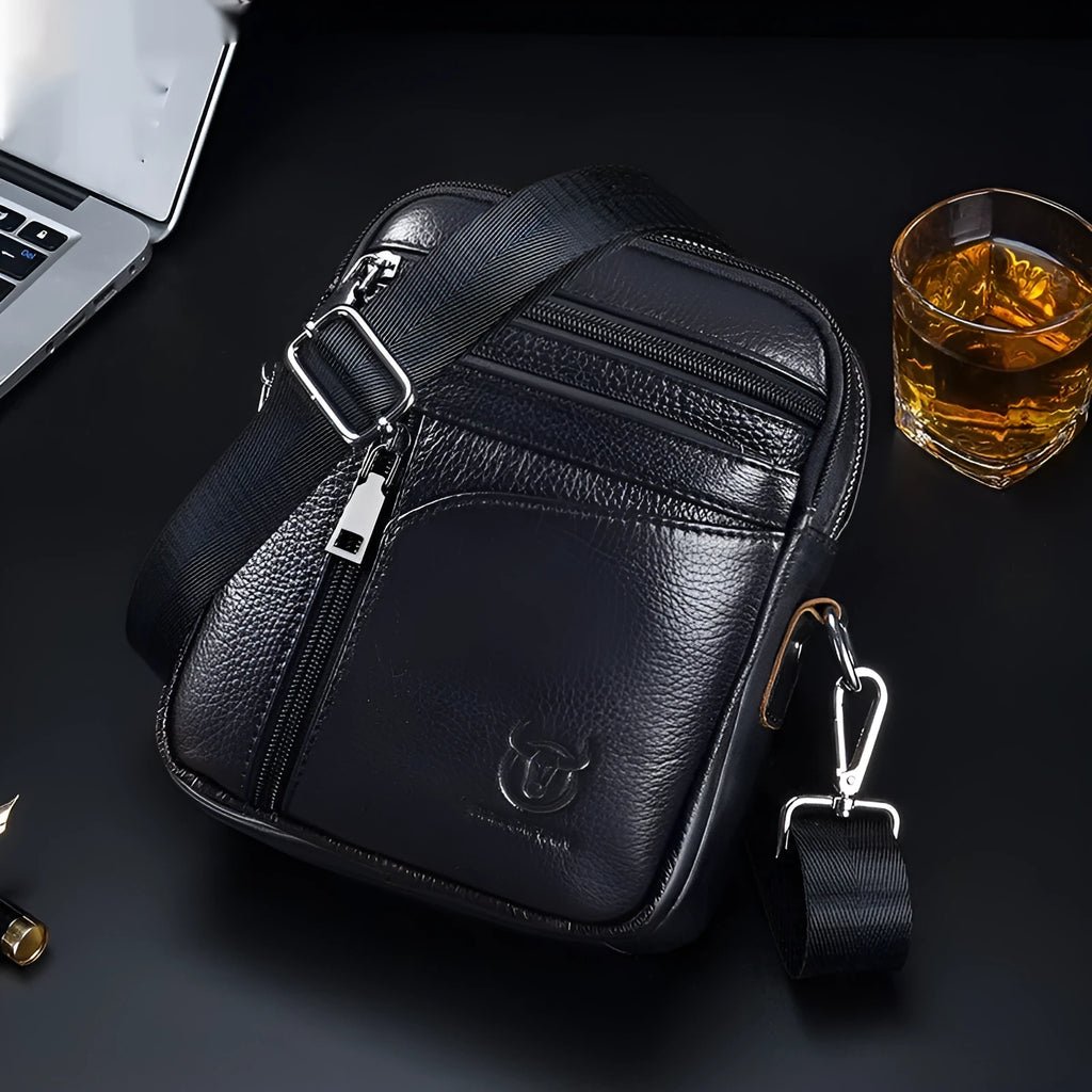 Men's black genuine leather shoulder messenger bag in a retro style.