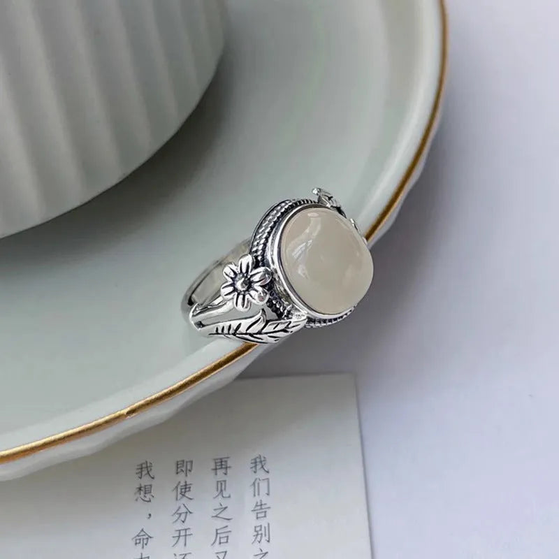Adjustable copper vintage ring with U-shaped design and white chalcedony aesthetic