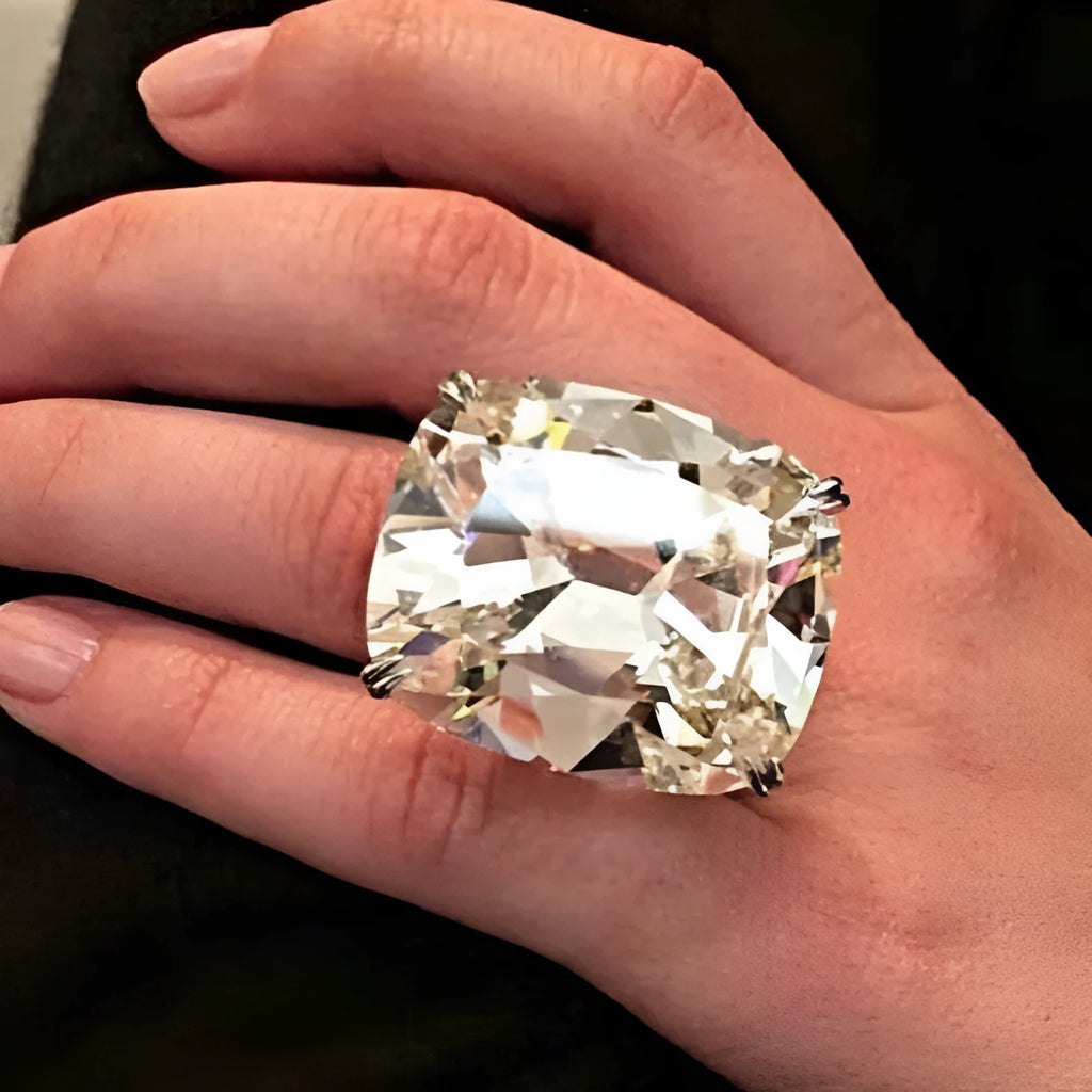Women's white gold colour square ring with geometric design and inlaid diamond detail