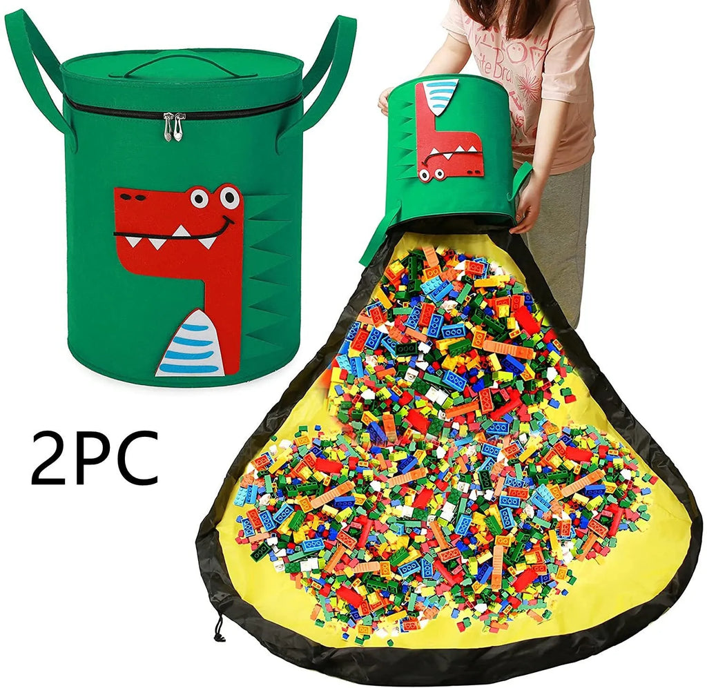 Green felt cube storage bag open as play mat with toys inside and pull rope visible