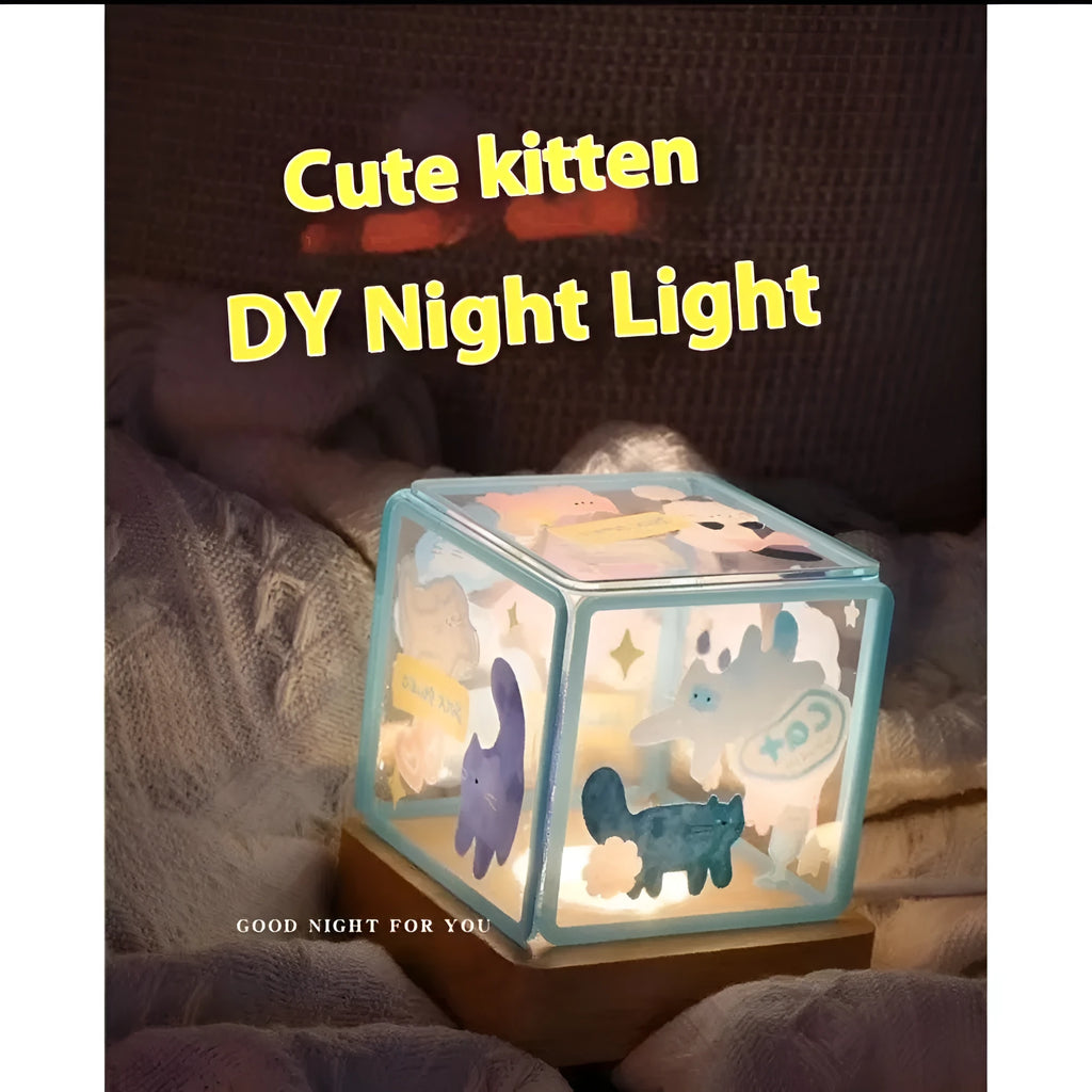 Acrylic self-adhesive USB small night lamp in kitten design, 8cm size, on a bedside table