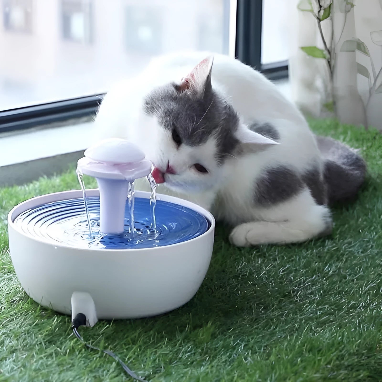 White automatic circulating water fountain for cats and dogs made of ABS plastic with dimensions 20x20x15cm
