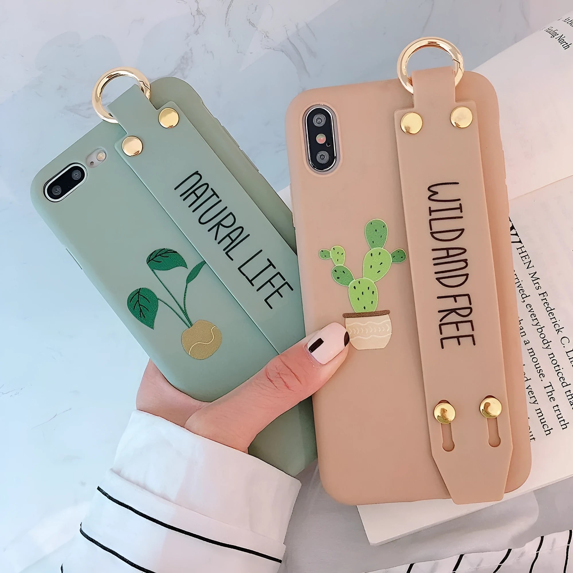 Green graffiti-style iPhone case with an integrated wristband holder on the back.