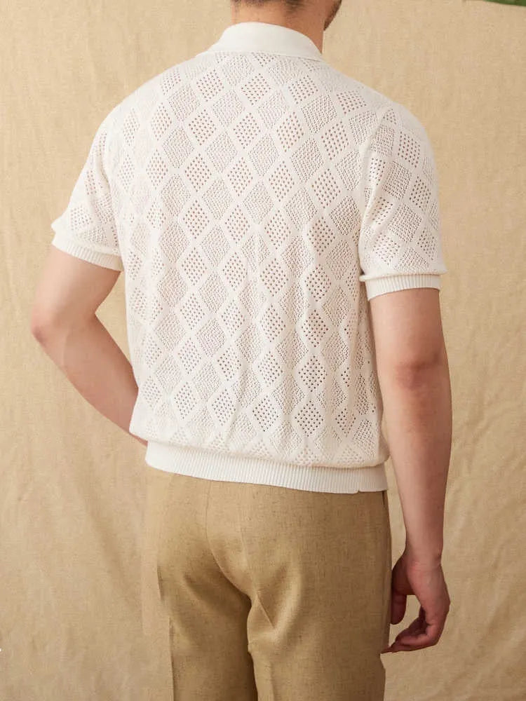 Light brown cotton cardigan with lapel collar, short sleeves, and a front zipper