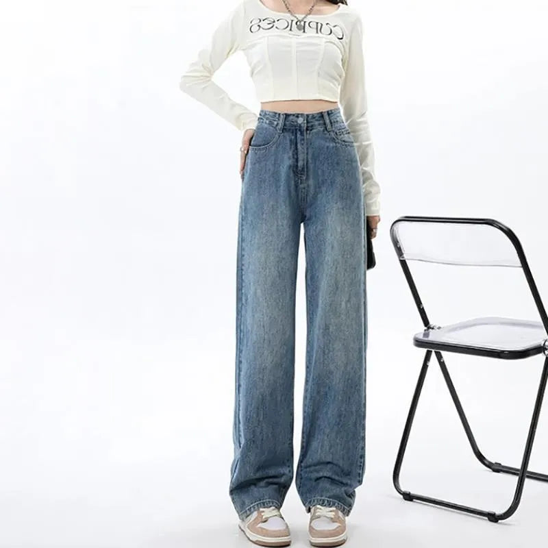 Women's retro blue wide leg jeans with high waist and straight leg design on hanger