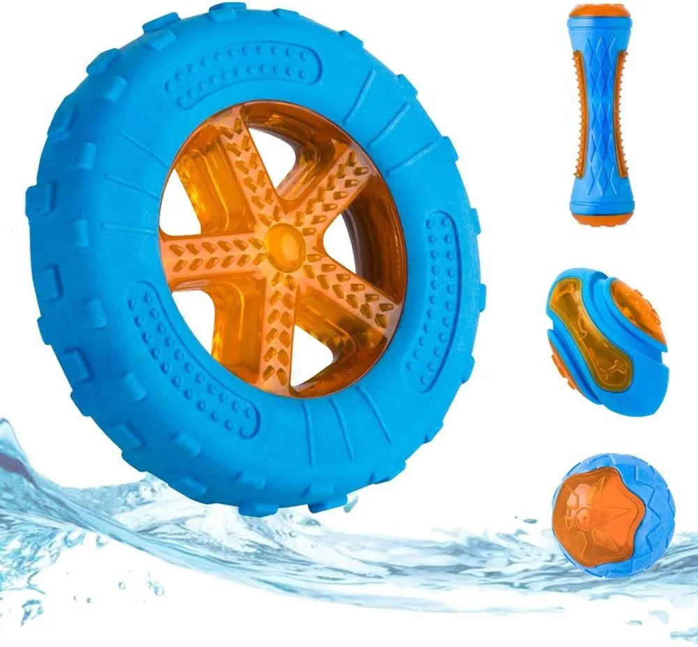 Set of three TPR dog toys: a yellow ball, a red barbell, and an orange tire with bumpy textures.