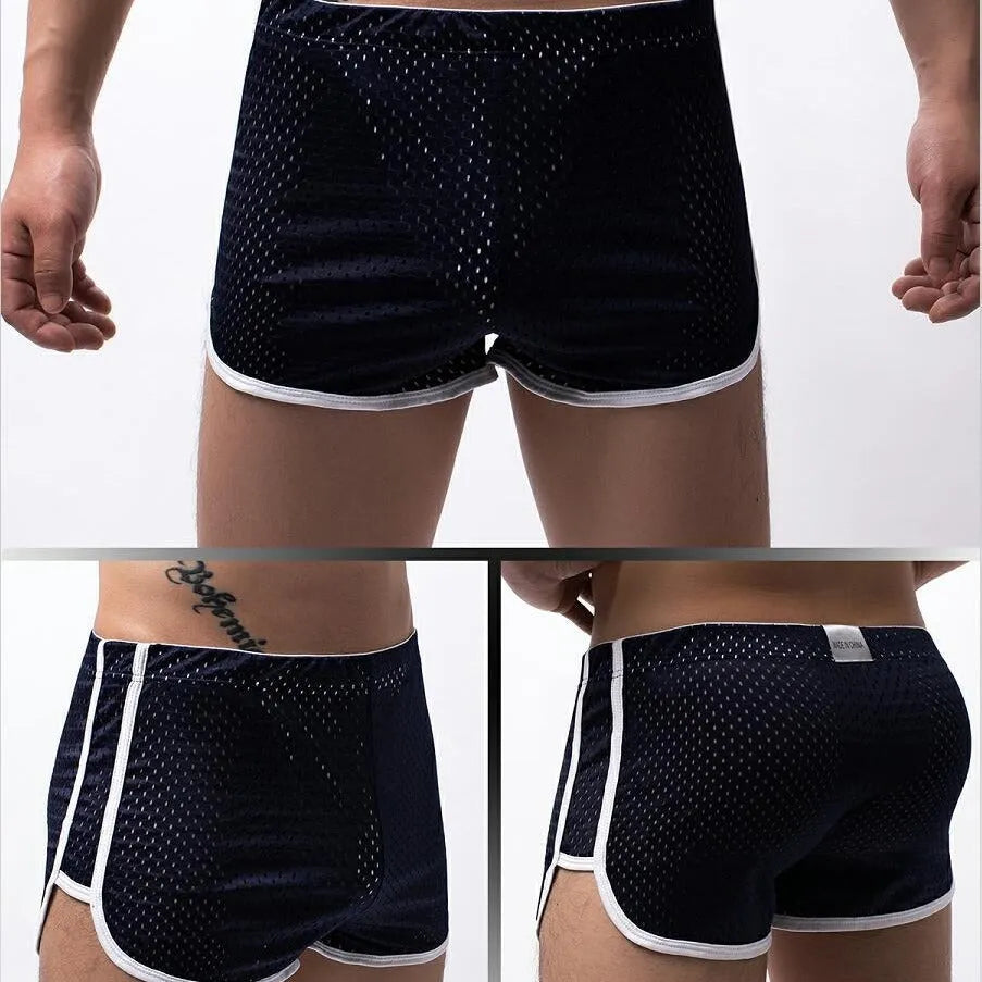 Men's grey cotton blend three-point boxer shorts laid flat, showing mid-waist design.