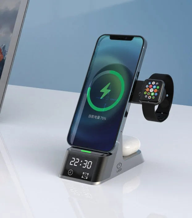 Black multifunctional alarm clock with digital display and wireless charging pad for smartphone, Apple Watch, and earphones.