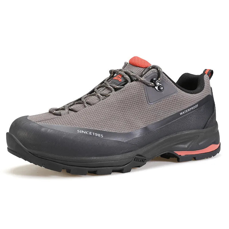 Men's low-top mountain climbing shoes in black with non-slip rubber soles and lace-up front closure