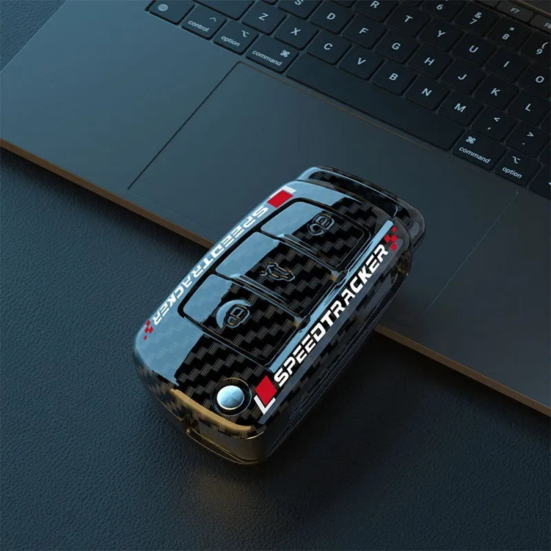 Carbon fibre style car key cover with mirror accent in carbon and white colour options
