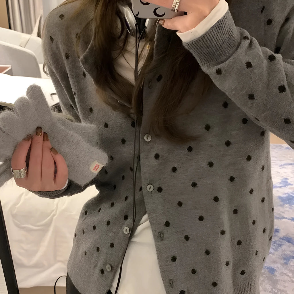 Women's gray dot knitted cardigan with crocheted flowers in black or gray.