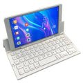 Black mini folding wireless Bluetooth keyboard for tablets with wrist support and aluminium bottom