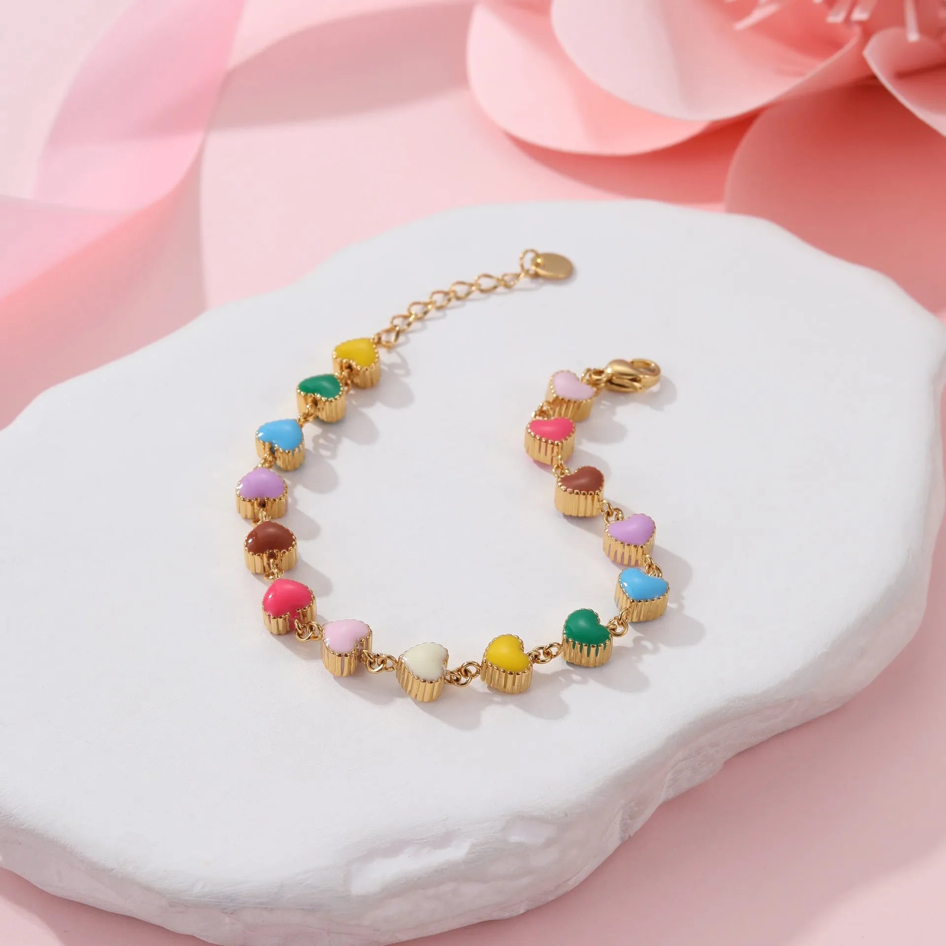 Gold plated women's bracelet with love heart pendant on titanium steel chain