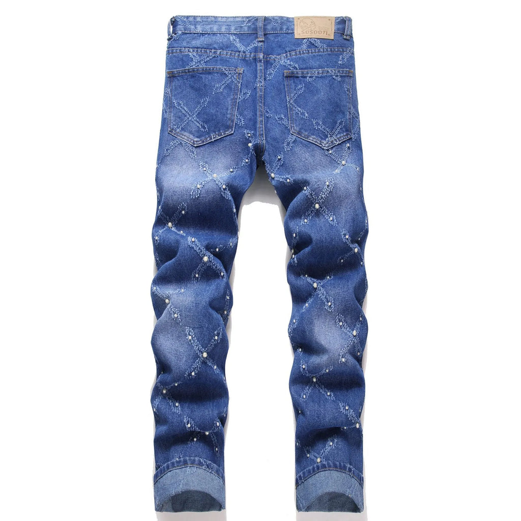 Pearl embroidery street trendy denim skinny pants in blue with mid-rise tapered leg and embroidered pearl details.