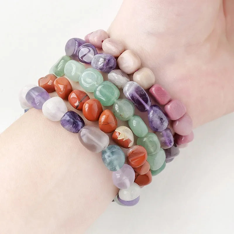 Natural amethyst large particle gravel rolling stone bracelet on a plain background showing smooth rounded beads