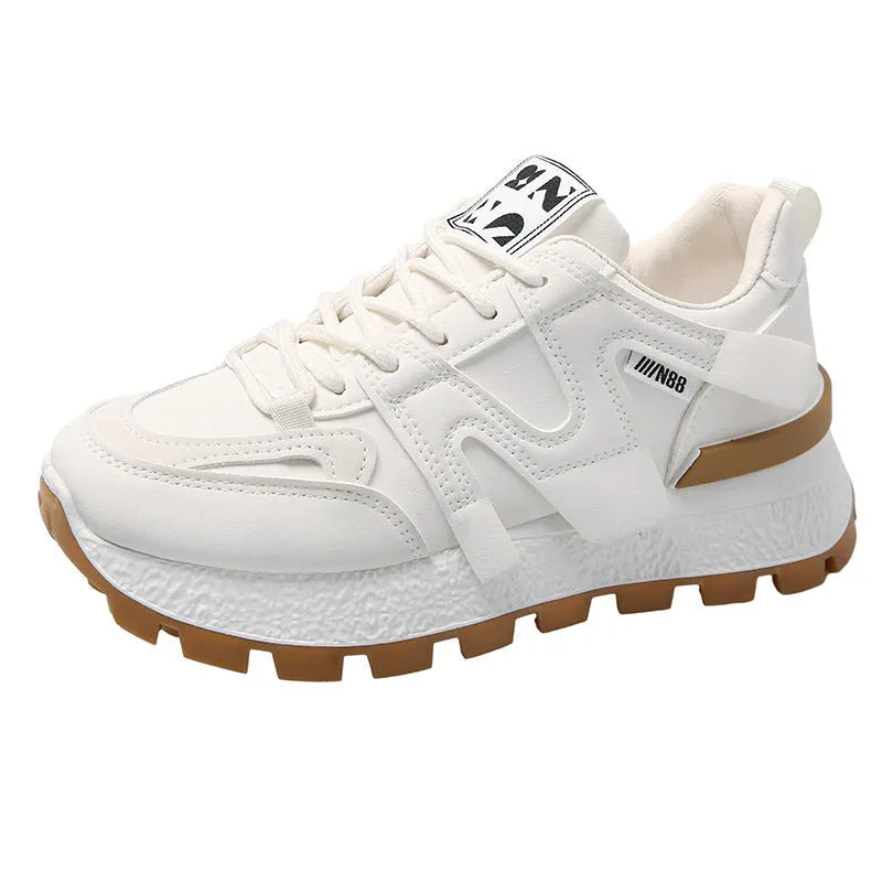 Artificial PU low top running sneakers in white and black colours with front lace-up design