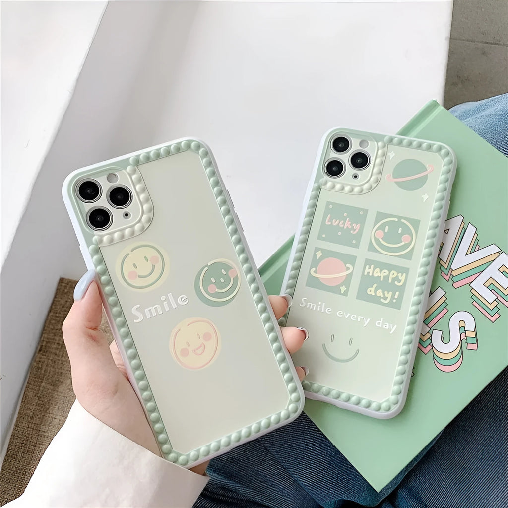 Green iPhone case with geometric polka dot frame and smiley face design for multiple iPhone models