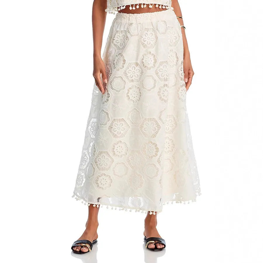 White women's two-piece suit with embroidered sleeveless top and long skirt in retro art style