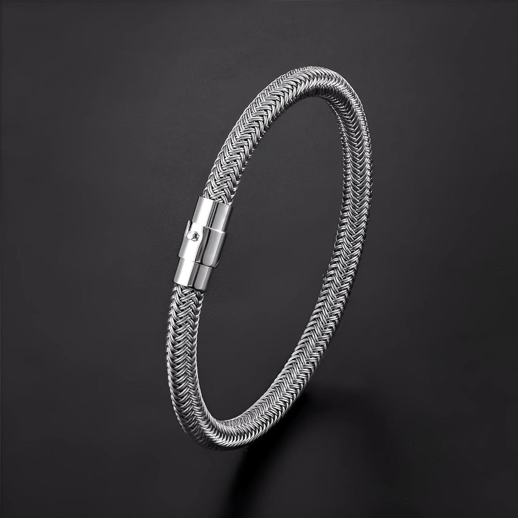 Geometric titanium steel wire bracelet with a magnetic clasp, shown in a unisex style.