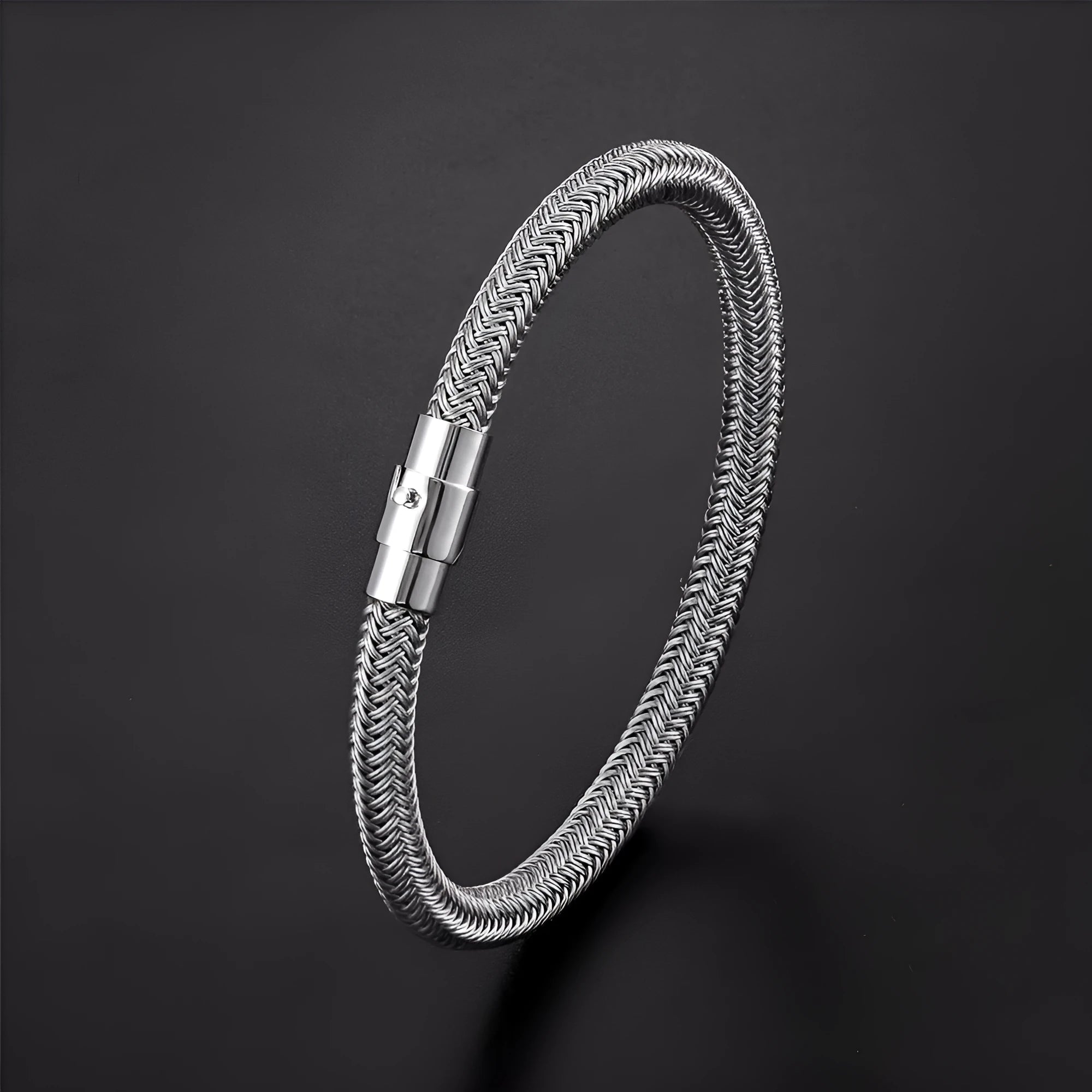 Geometric titanium steel wire bracelet with a magnetic clasp, shown in a unisex style.