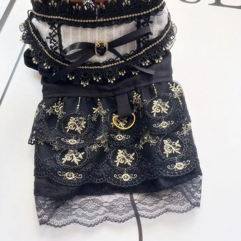 Golden gothic-style skirt costume for a small dog or cat on a mannequin.