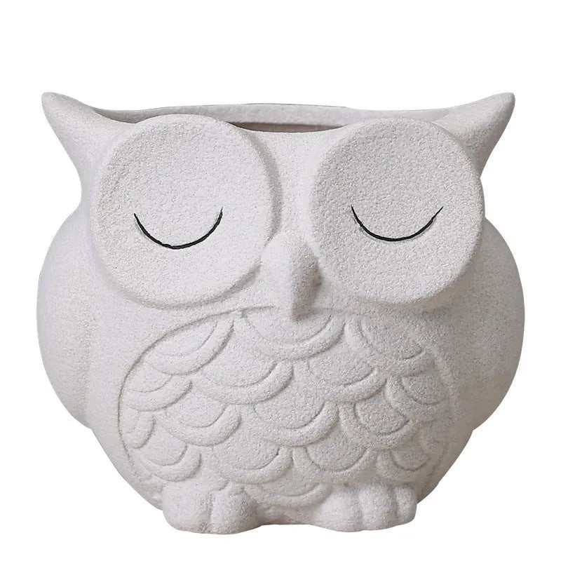 Handmade frosted ceramic owl design succulent flower pot in light pink colour.