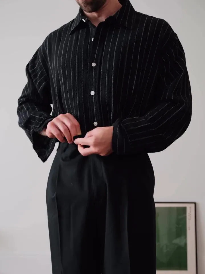 Black pinstriped polyester button-down shirt with regular fit and long sleeves
