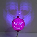 Pumpkin shaped USB rechargeable lamp with yellow or purple light options for holiday decoration