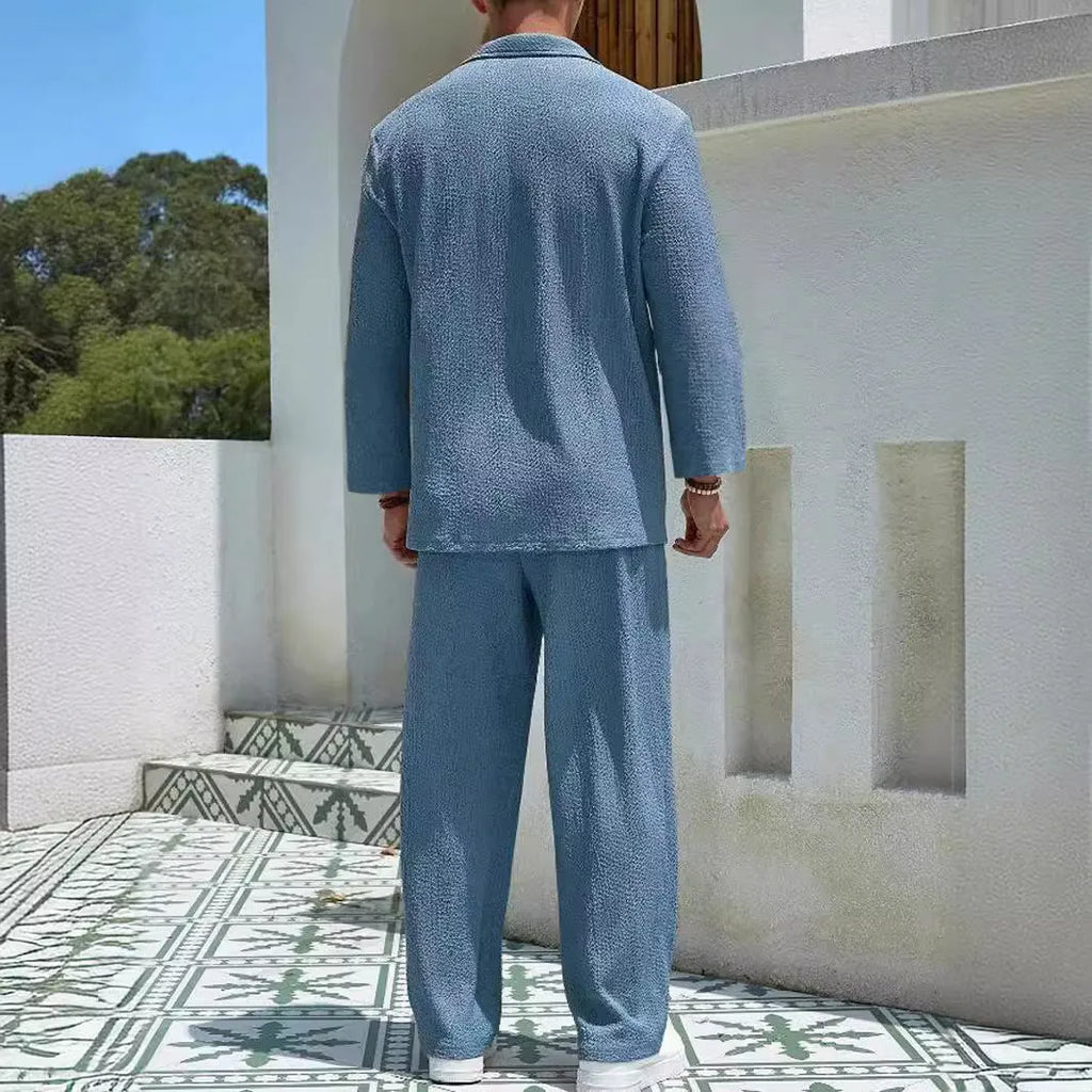 Men's casual shirt and trousers polyester suit set in lake blue colour for autumn wear.