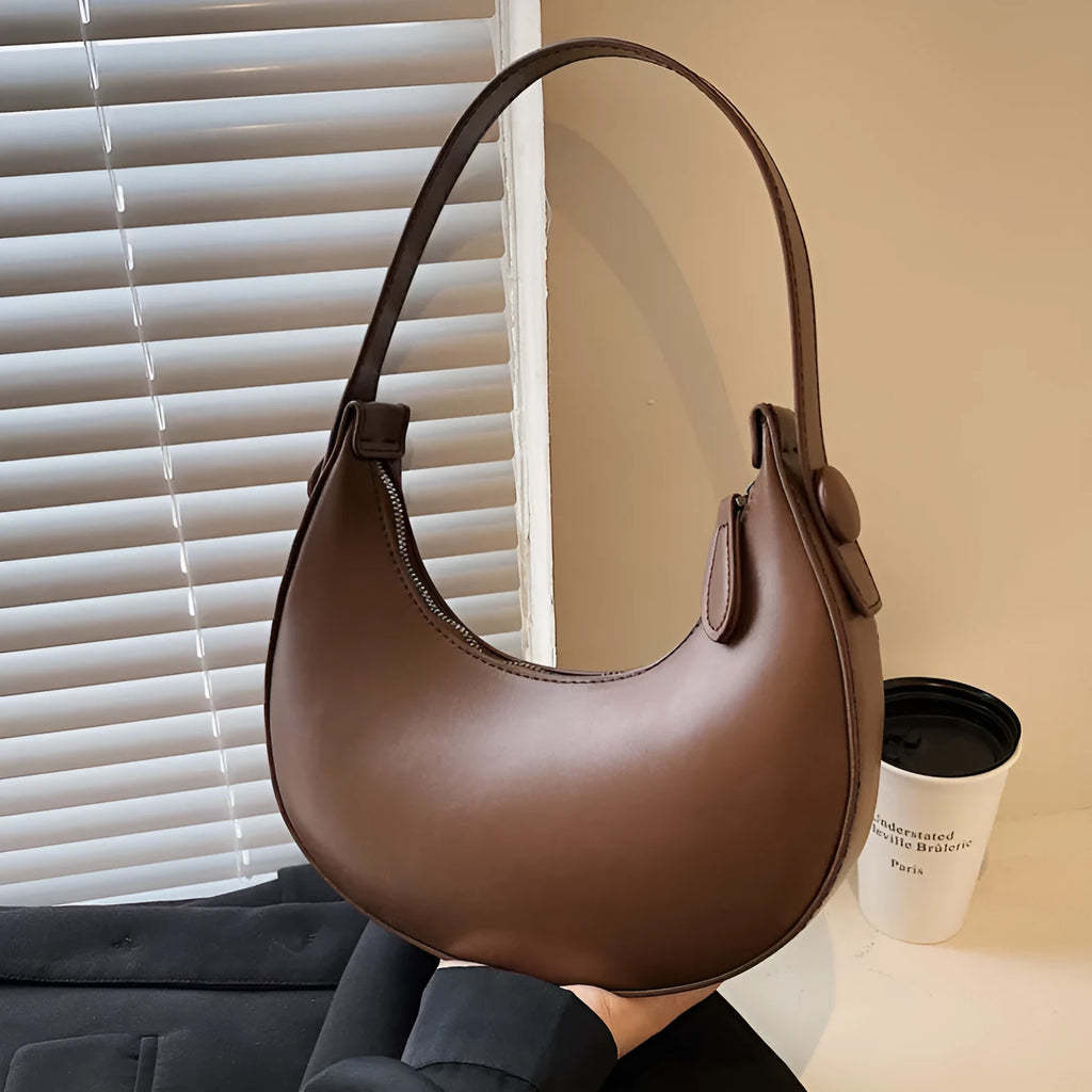 Women's retro dumpling-shaped PU shoulder bag in cream yellow with sandwich pocket