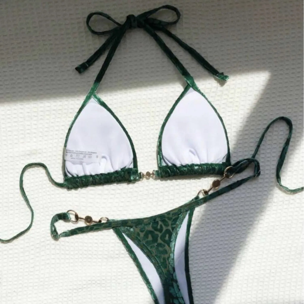 Blue leopard print women's bikini set on a mannequin, showing triangle top and briefs style.