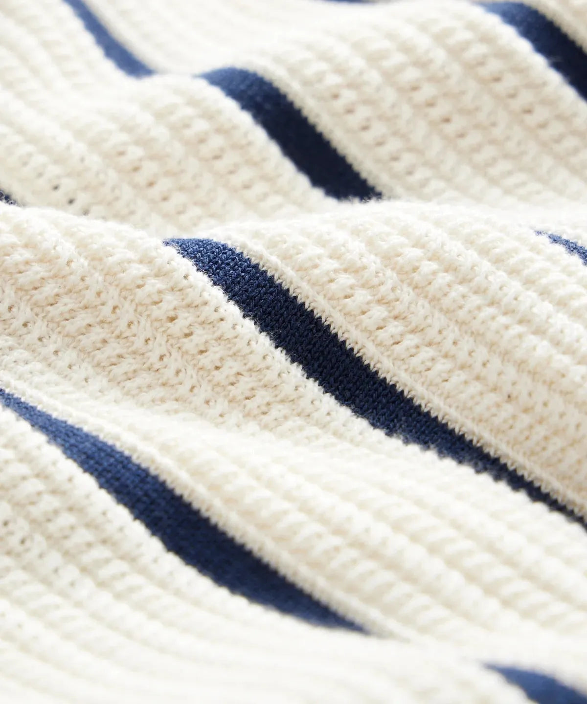 Men's white knitted short sleeve shirt with asymmetric lapel design and striped pattern detail