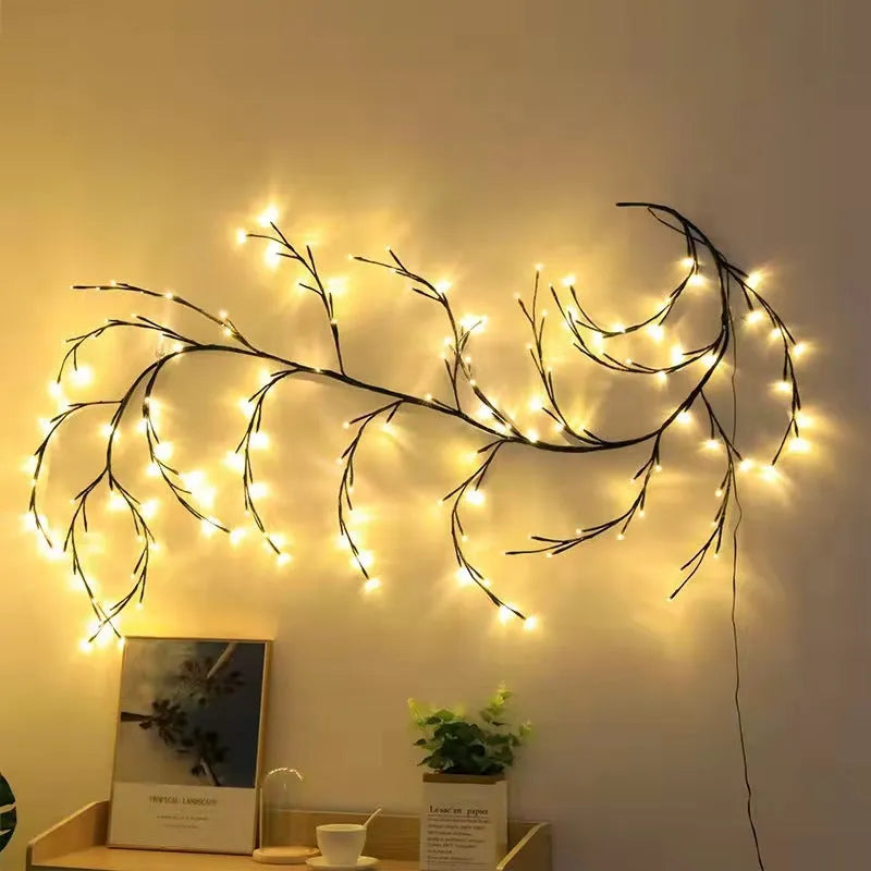 Flexible Christmas vine garland with warm white LED lights and birch bark texture bent into decorative shape