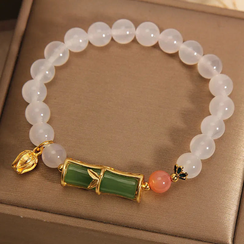 White agate jasper bracelet with a natural jade bead and bamboo joint design