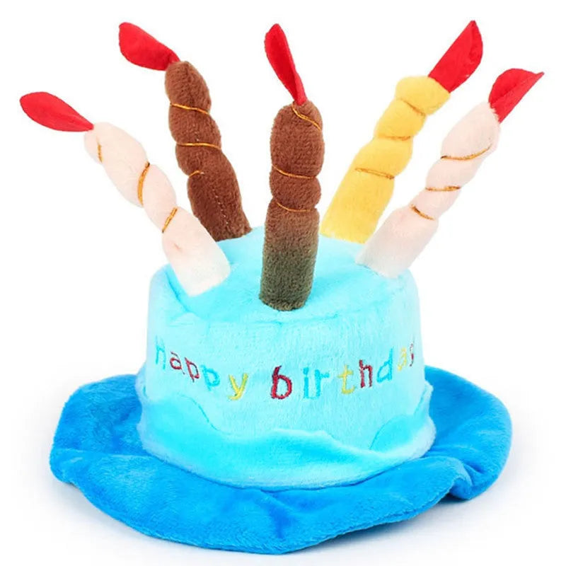 Blue and pink birthday hats for toy dogs on a festive background.