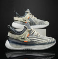 Men's white low-top platform sneakers with woven mesh upper and round toe.