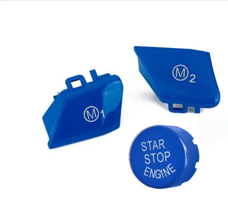 A pair of red M1M2 steering wheel mode buttons for BMW F30 and F34 models