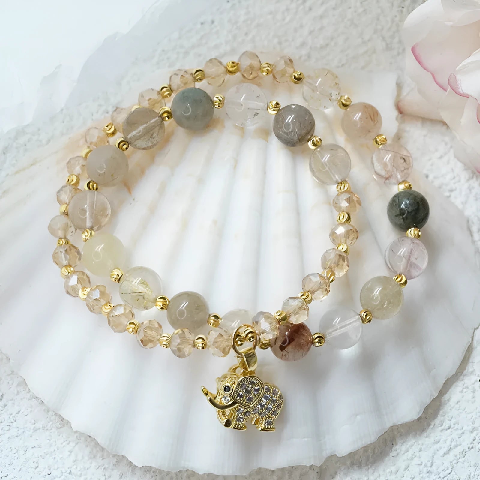 Women's retro bracelet with strawberry quartz hair crystal stones showing 521 colour variations