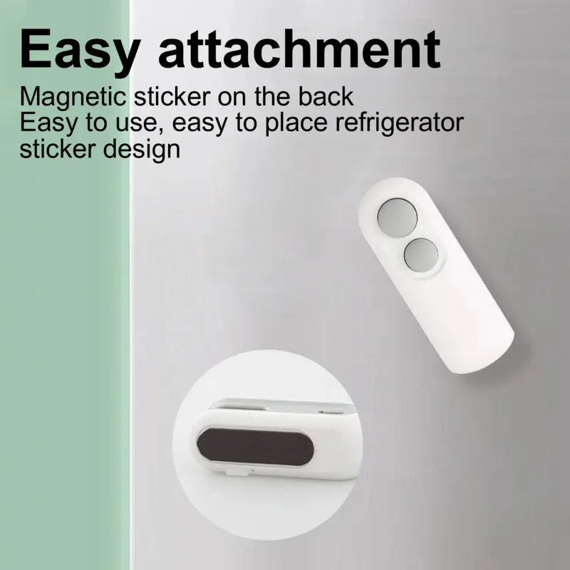 Handheld vacuum bag sealer in blue with USB charging port and cutter blade