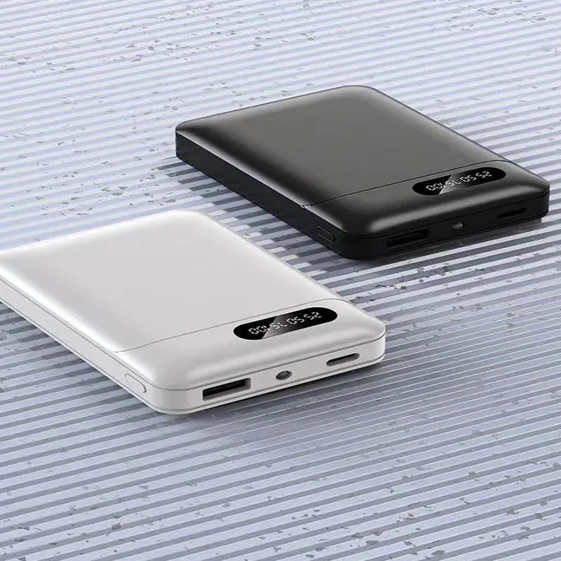 White portable power bank with multi-USB ports measuring 92x63x23mm