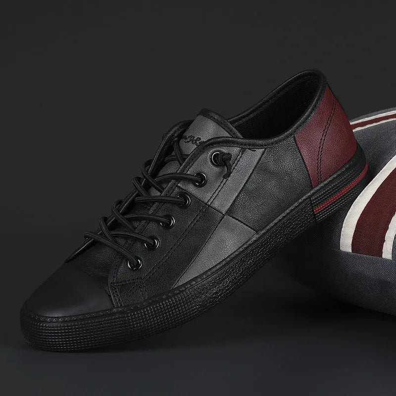 Men's leather shoes with elastic band fastening in black and white colour combination with rubber soles