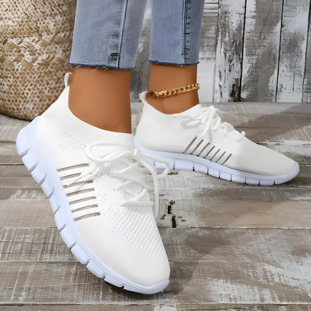 Women's breathable high-top lace-up casual sneakers in black with rubber sole and flat heel