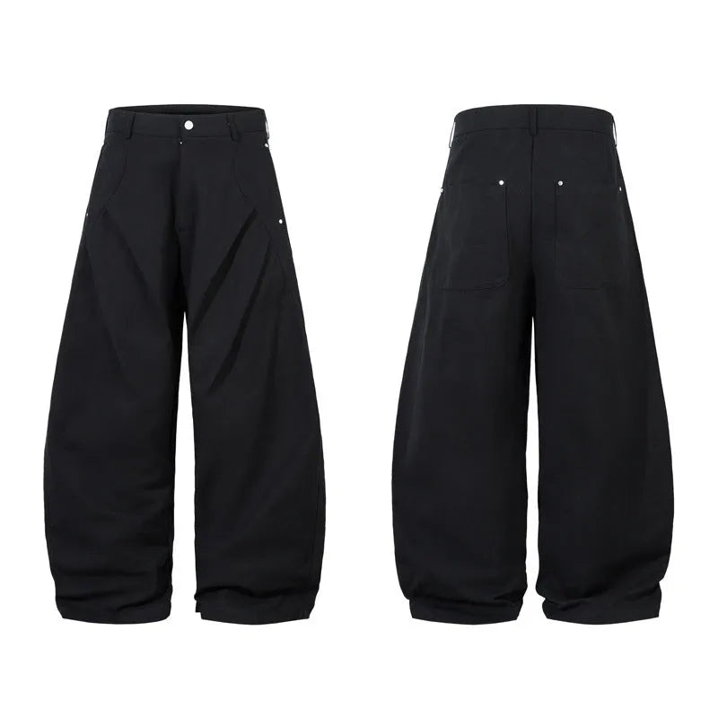 Black men's wide-leg casual trousers with front pleated machete detailing on a mid waist.