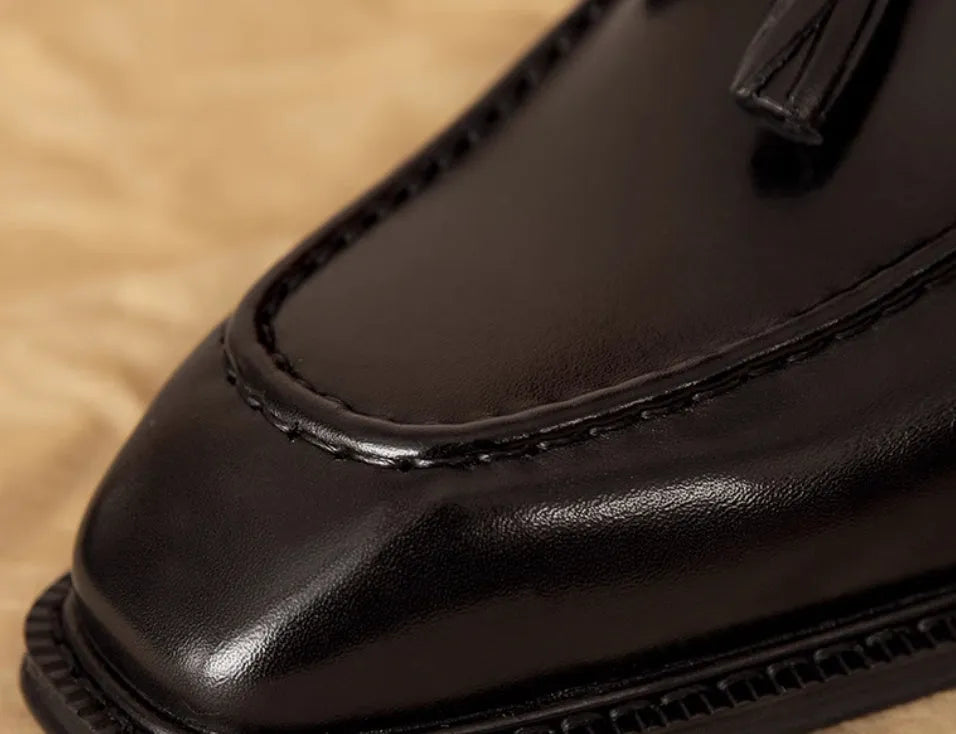 Men's black genuine leather slip-on loafers with fringed British-style design