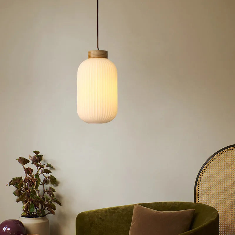 Nordic style wooden pendant ceiling light with solid wood retro design in a bedroom setting.